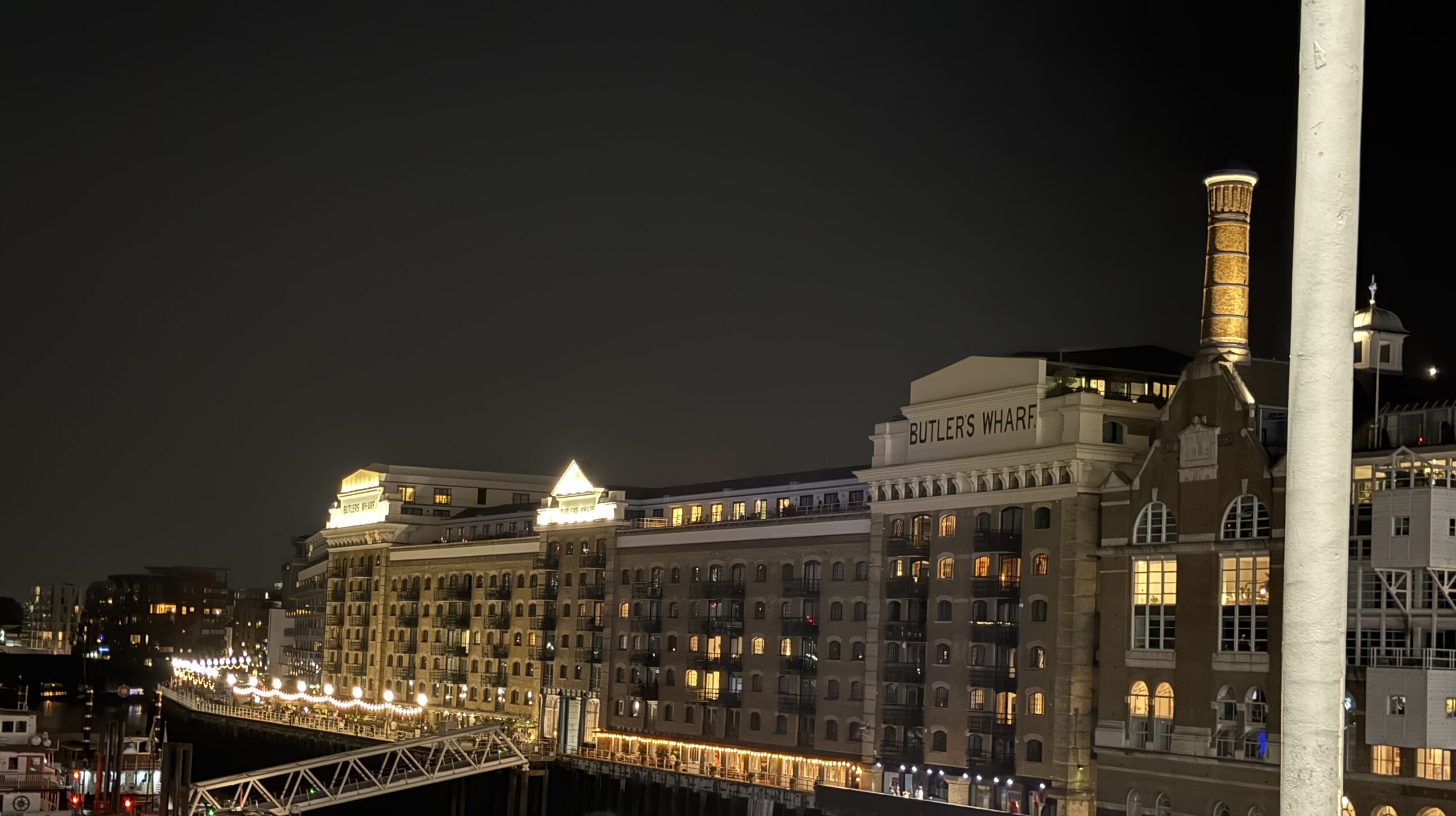 Butlers Wharf riverside development at night — businesses covered by iRepairMan mobile repair service
