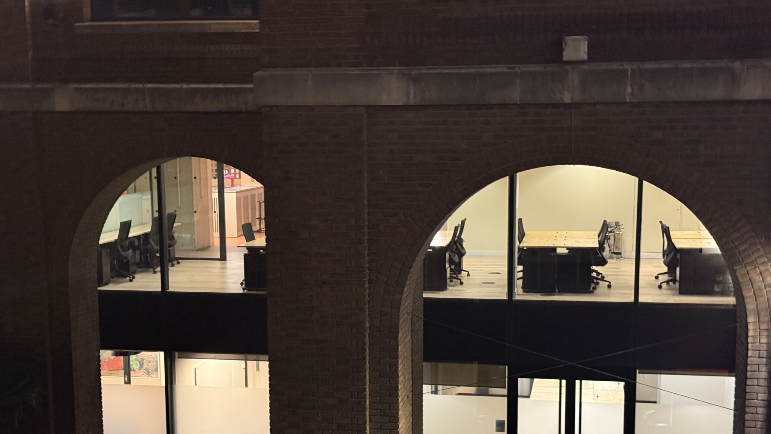 Modern office spaces in brick arches near Tower Bridge — ideal for on-site iPhone, iPad and Samsung repairs