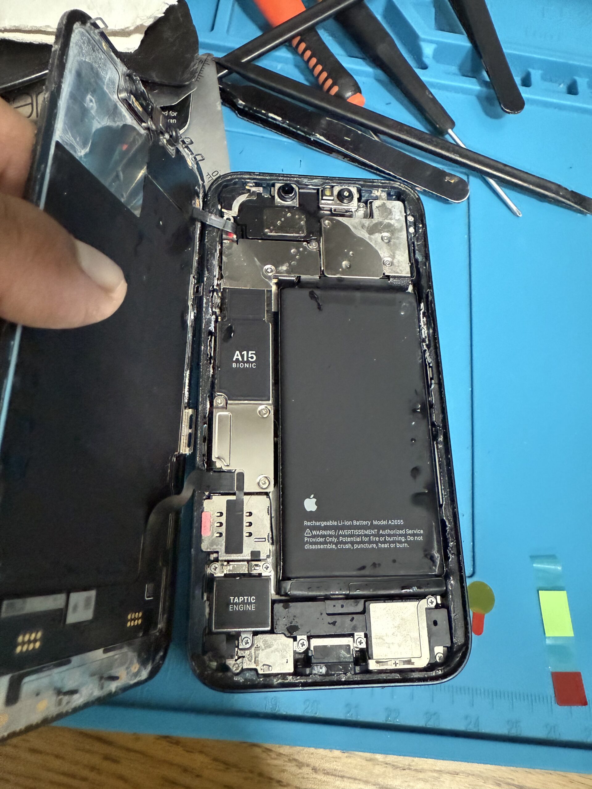 Before: water-damaged iPhone 13 after sea exposure, screen dead
