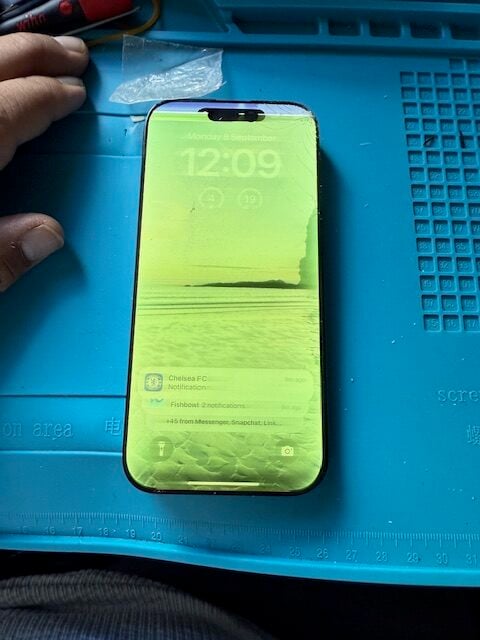 Broken iPhone 16 Pro screen with green line damage before repair in Primrose Hill NW1.