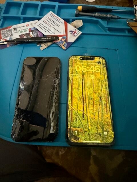 Repaired iPhone 15 Pro after on-site fix at Heathrow Terminal 5 Caffè Nero