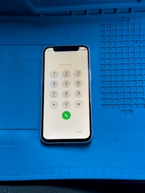 iPhone 12 mini repaired and working with clear emergency dial screen after iRepairMan service