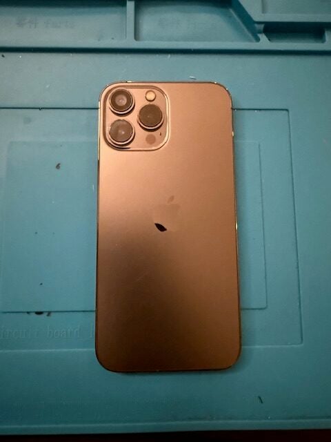 After repair close-up: iPhone 13 Pro Max rear cameras with new protective glass installed in Woodford IG8