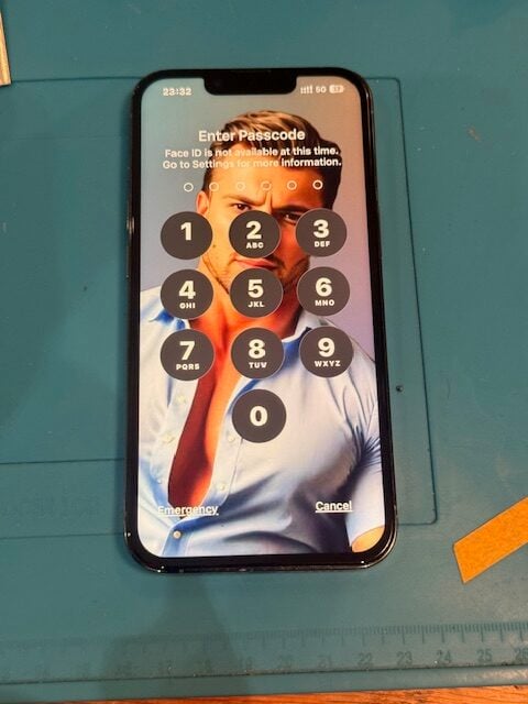 iPhone 13 Pro fully restored showing passcode screen after emergency repair in Westminster SW1P