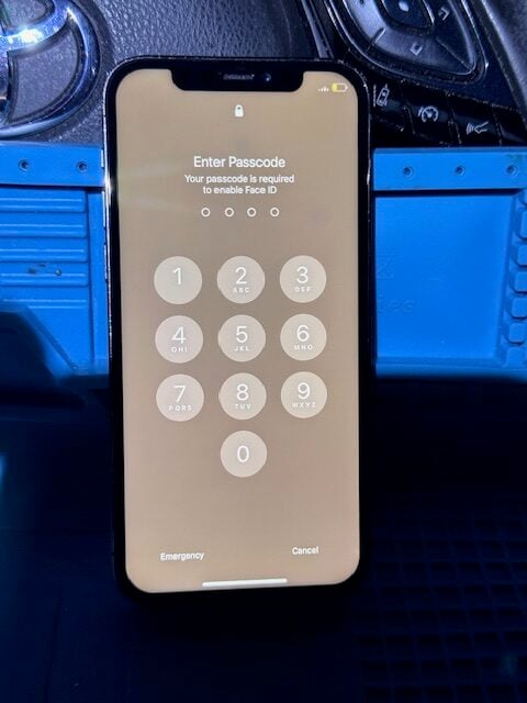 After repair: iPhone 12 Pro passcode screen ready