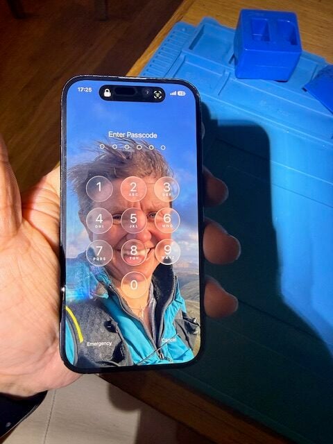 iPhone 16 lock screen after Apple Genuine display replacement at Heathrow Terminal 3
