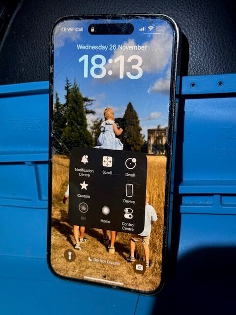 Cracked iPhone 14 Pro Max screen before doorstep repair in Stamford Brook W4