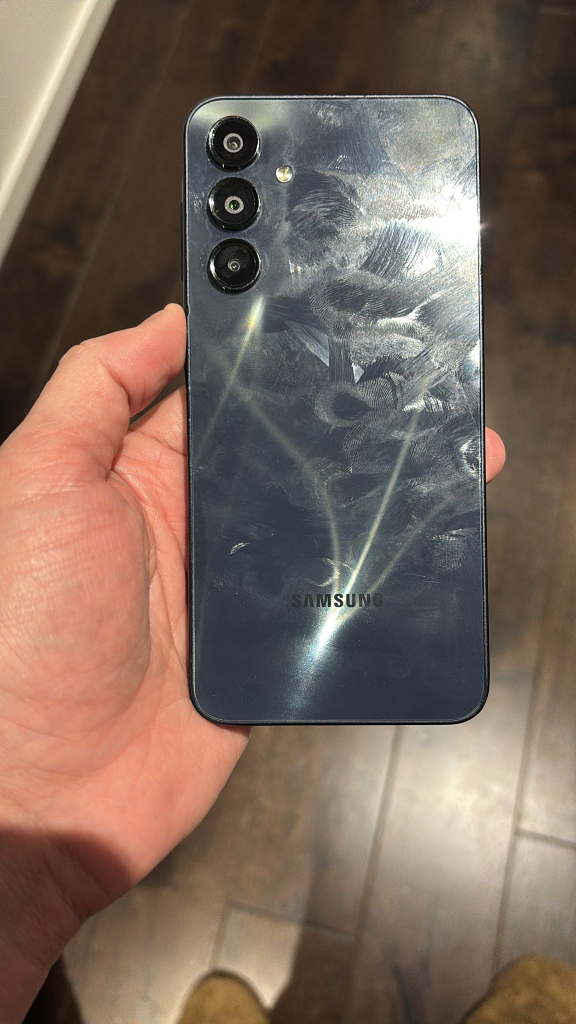 Back view of Samsung Galaxy A16 5G showing wear marks before emergency phone repair in London
