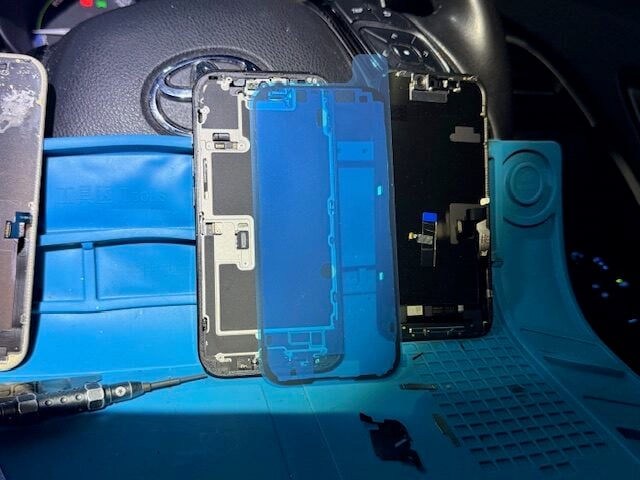 Step 6 technician continues iPhone 16 Pro screen repair with precision tools and ESD precautions