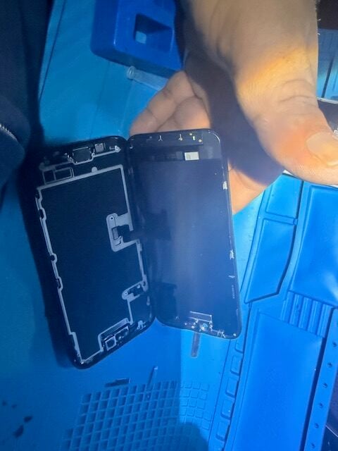 Step 7 iPhone 16 Pro screen repair nearing completion during mobile call-out service