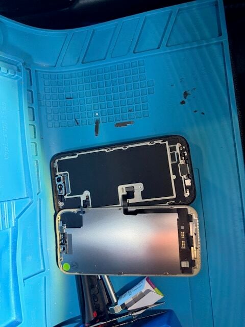 Step 4 iPhone 16 Pro disassembly stage during mobile screen repair process