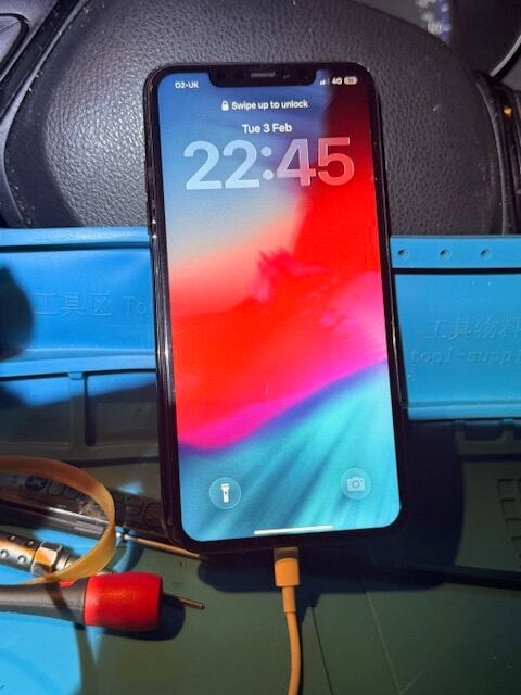 iPhone working and charging after emergency night screen repair at hospital