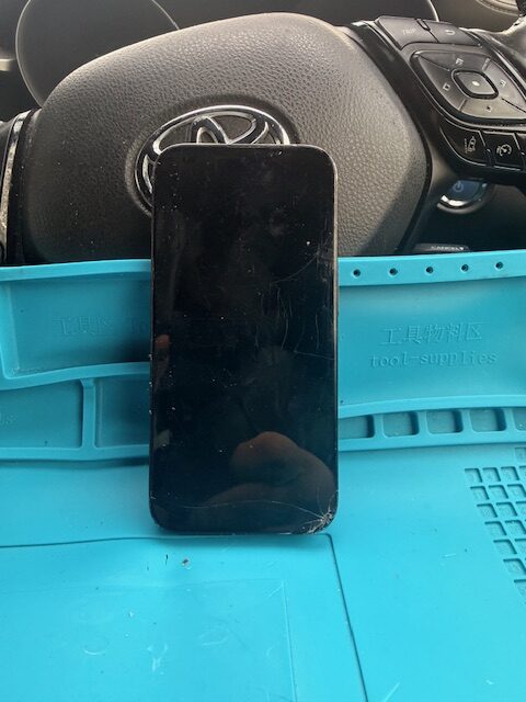 iPhone 15 Pro with severely damaged LCD screen not showing display before emergency repair near Paddington Green W2 London