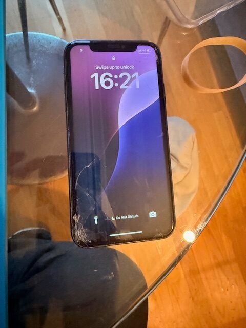 Cracked iPhone screen before repair