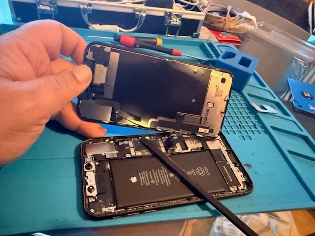 Cracked iPhone screen before repair