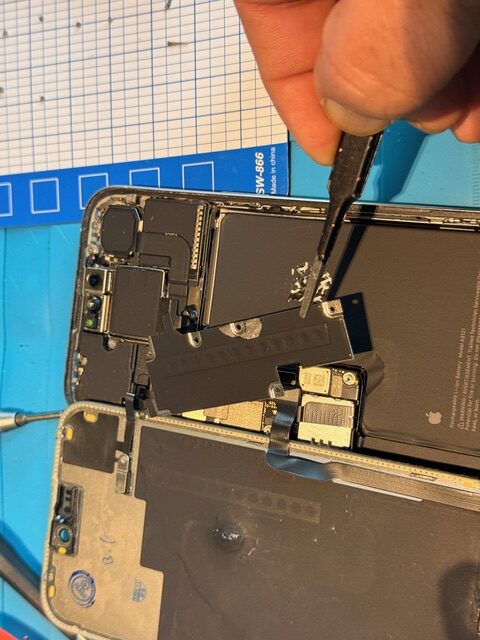 Step 1 iPhone 15 Pro Max opened and metal shield removed during screen repair