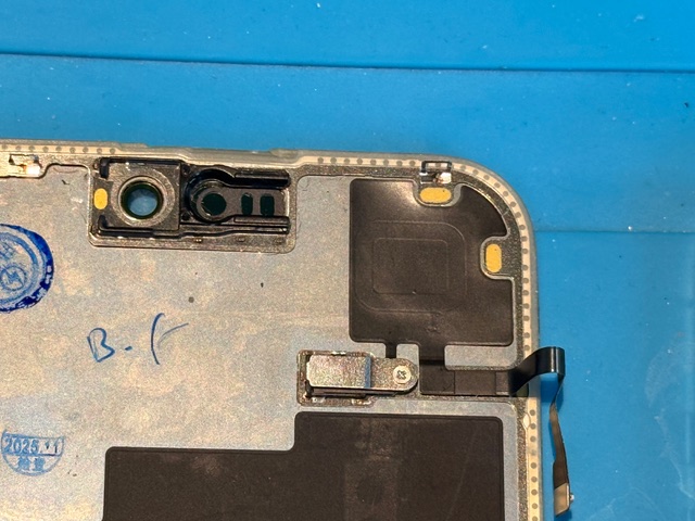 Step 3 proximity sensor flex cable removed from old broken iPhone 15 Pro Max screen during repair