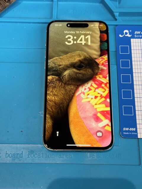 Step 7 iPhone 15 Pro Max after repair with fully working screen and restored display